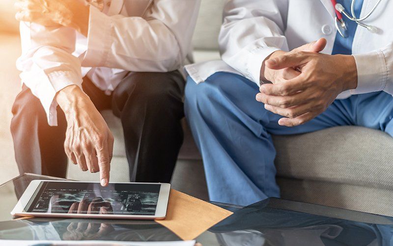 Doctor With Patient — Lafayette, LA — Acadiana Urgent Care Center