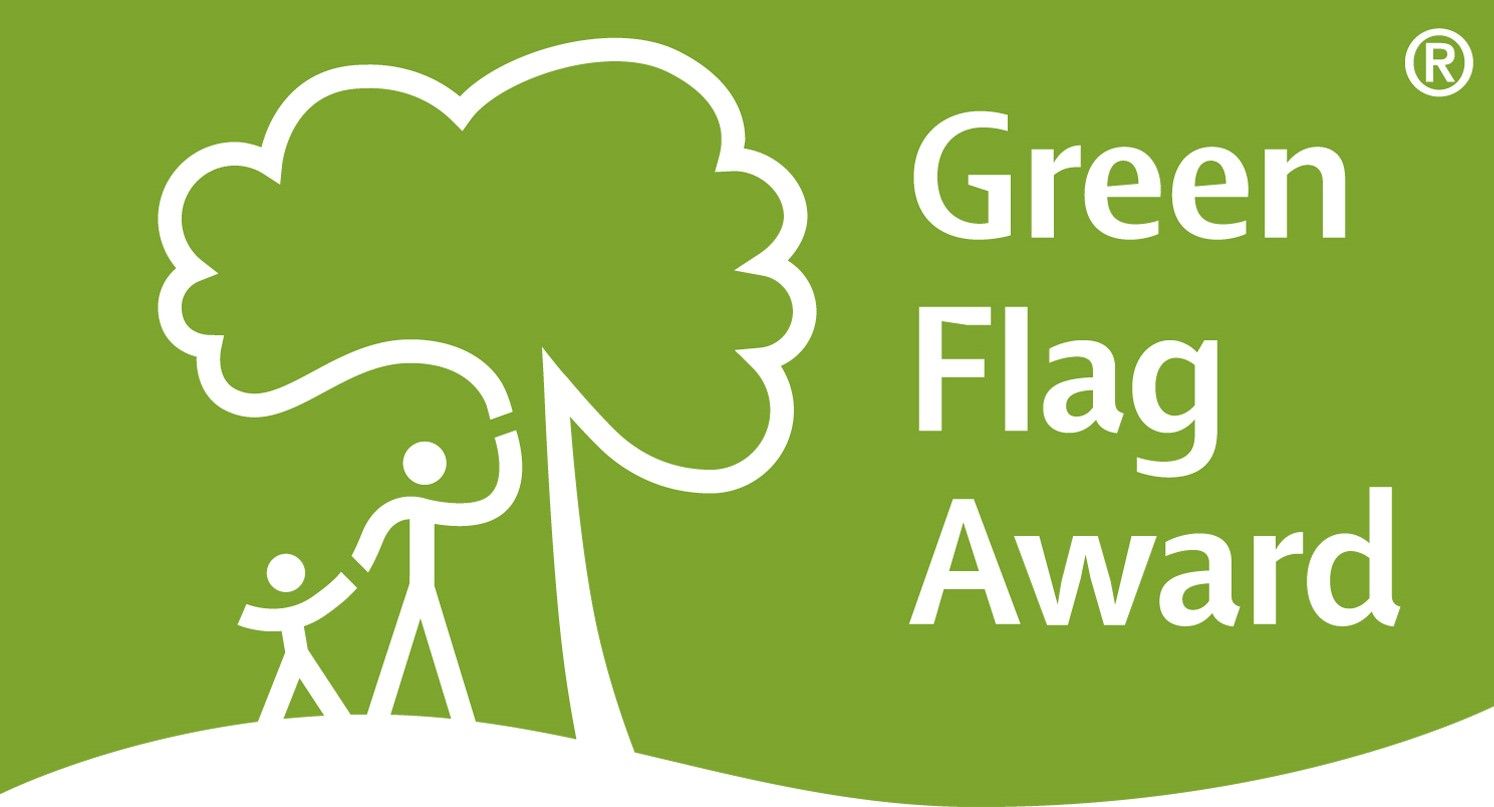A green flag award logo with a tree and two people.