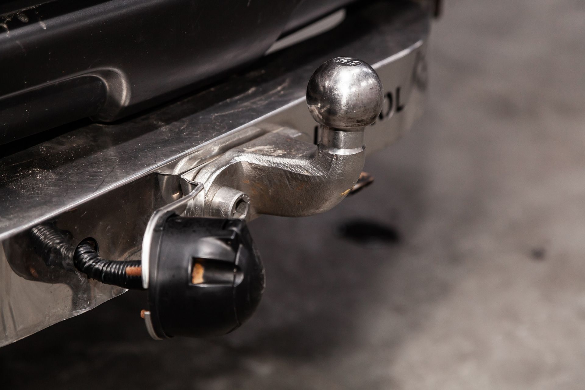 A Close Up Of A Tow Hook On The Back Of A Car — Tamworth Muffler Man In Armidale, NSW