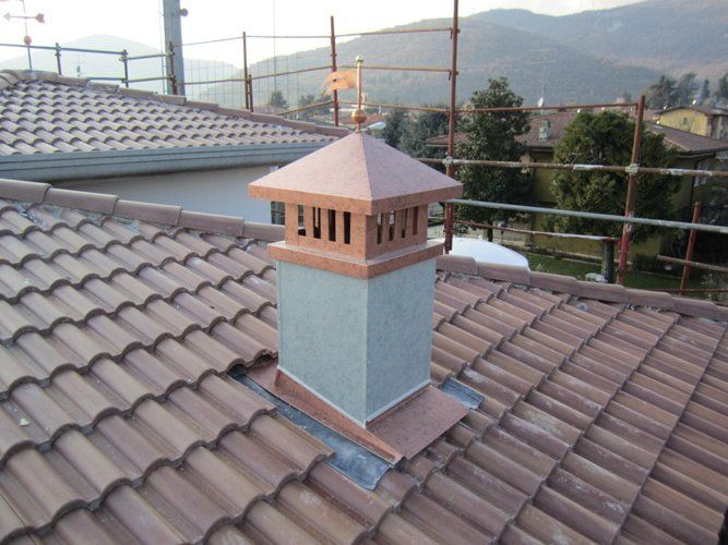 canna fumaria caminetto in rame