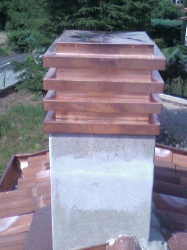 comignolo in rame per camino