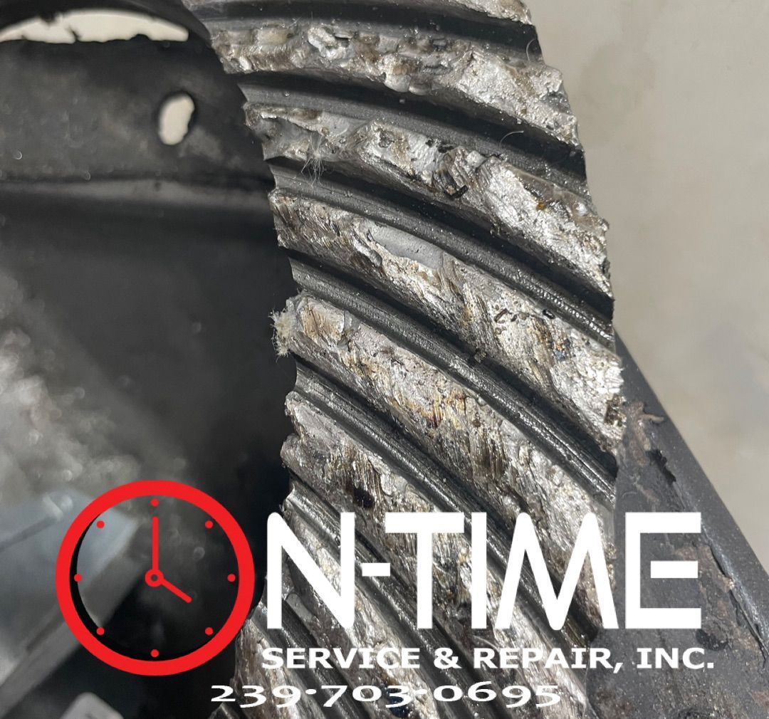 A close up of a tire with the words on time service & repair inc.