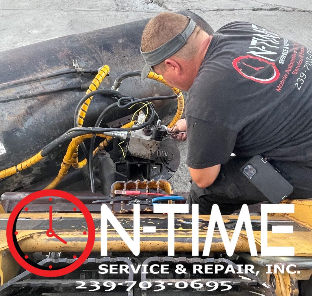 A man is working on a machine that says on time service & repair inc.