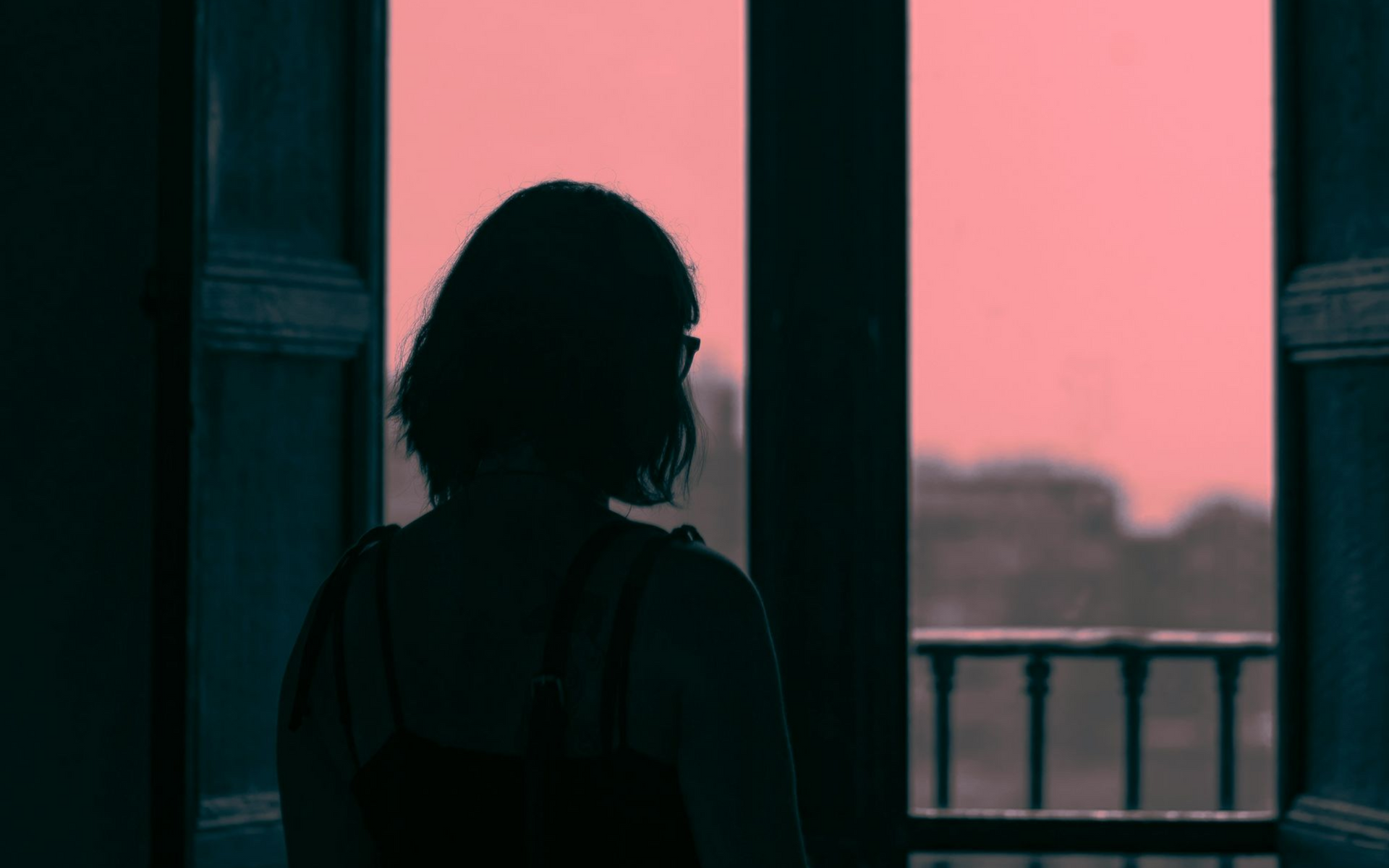 Highly sensitive woman experiencing evening overwhelm that can lead to night time binge eating