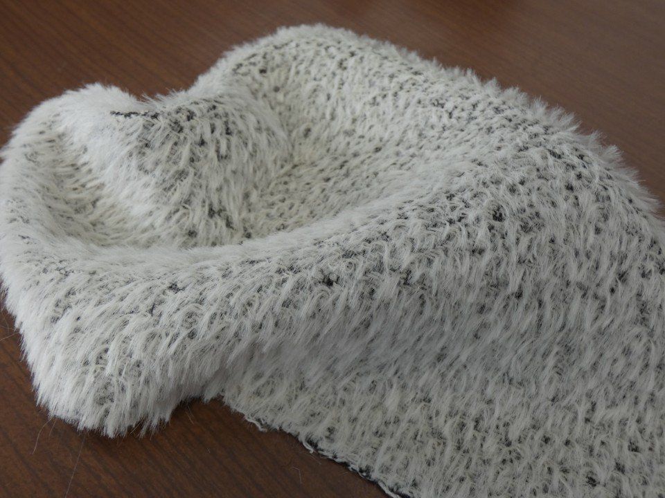 long-haired white winter fabric