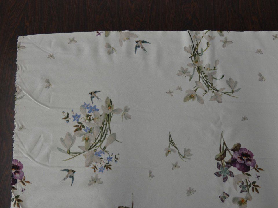 winter fabric with light blue and purple flowers
