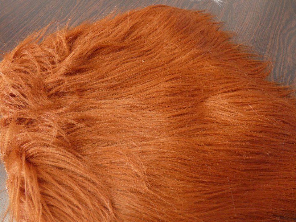 long-haired rust-coloured fabric
