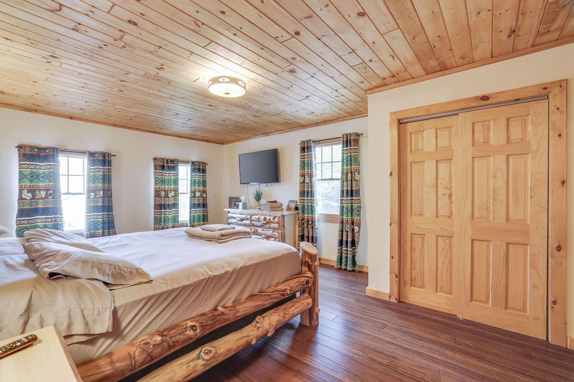 There is a large bed in the middle of the room.