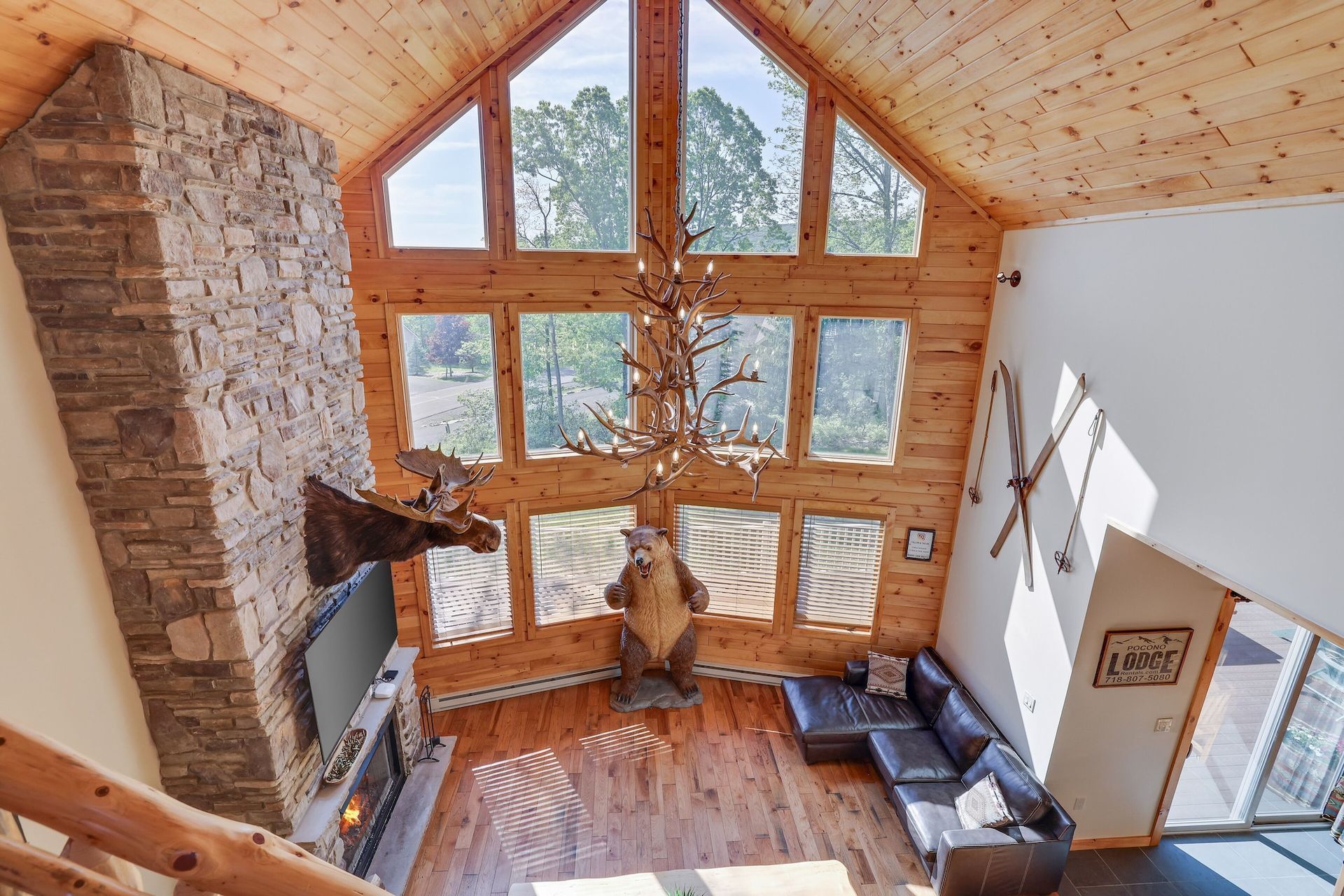 An aerial view of a living room in a log cabin.