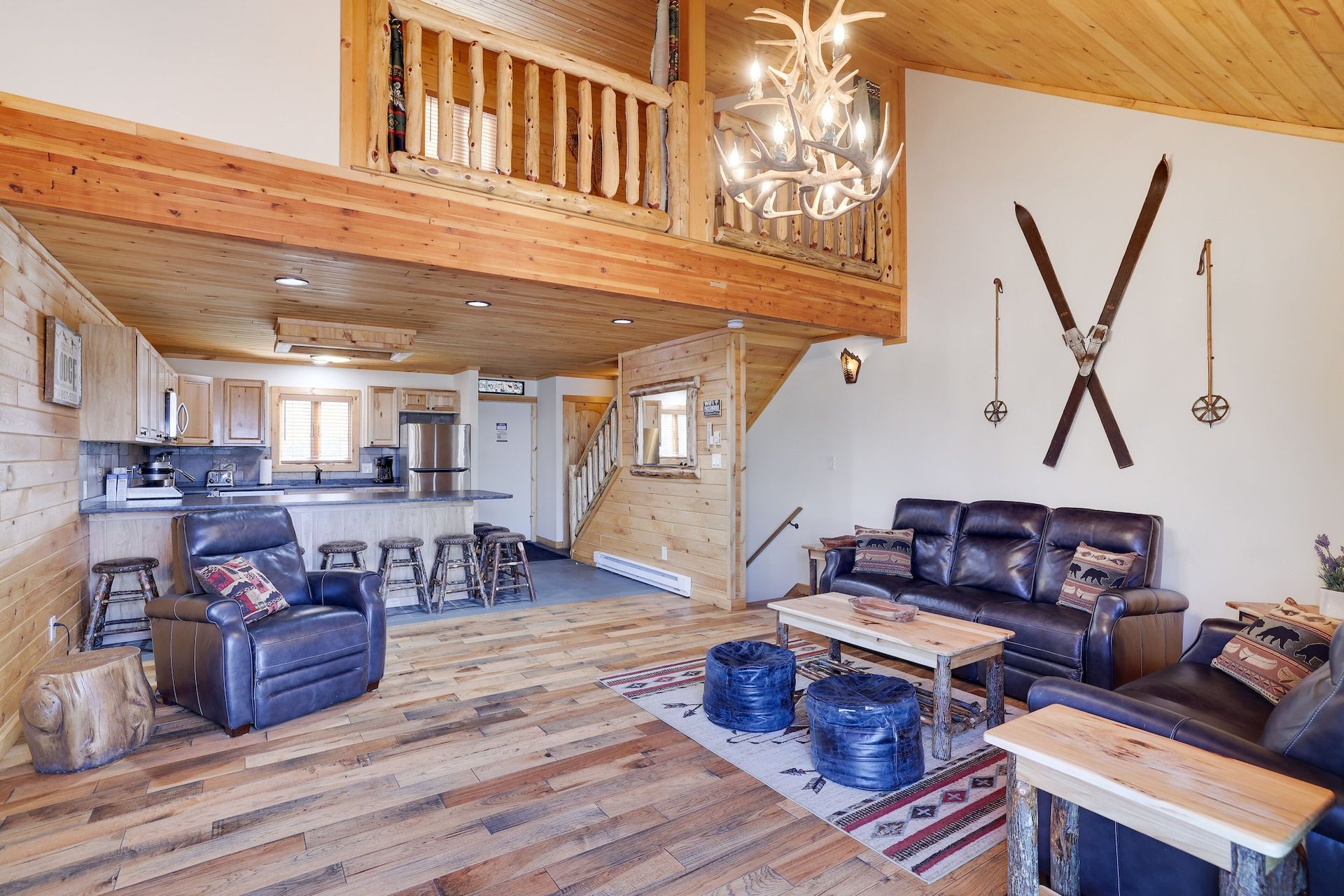 A living room with a fireplace and a flat screen tv.