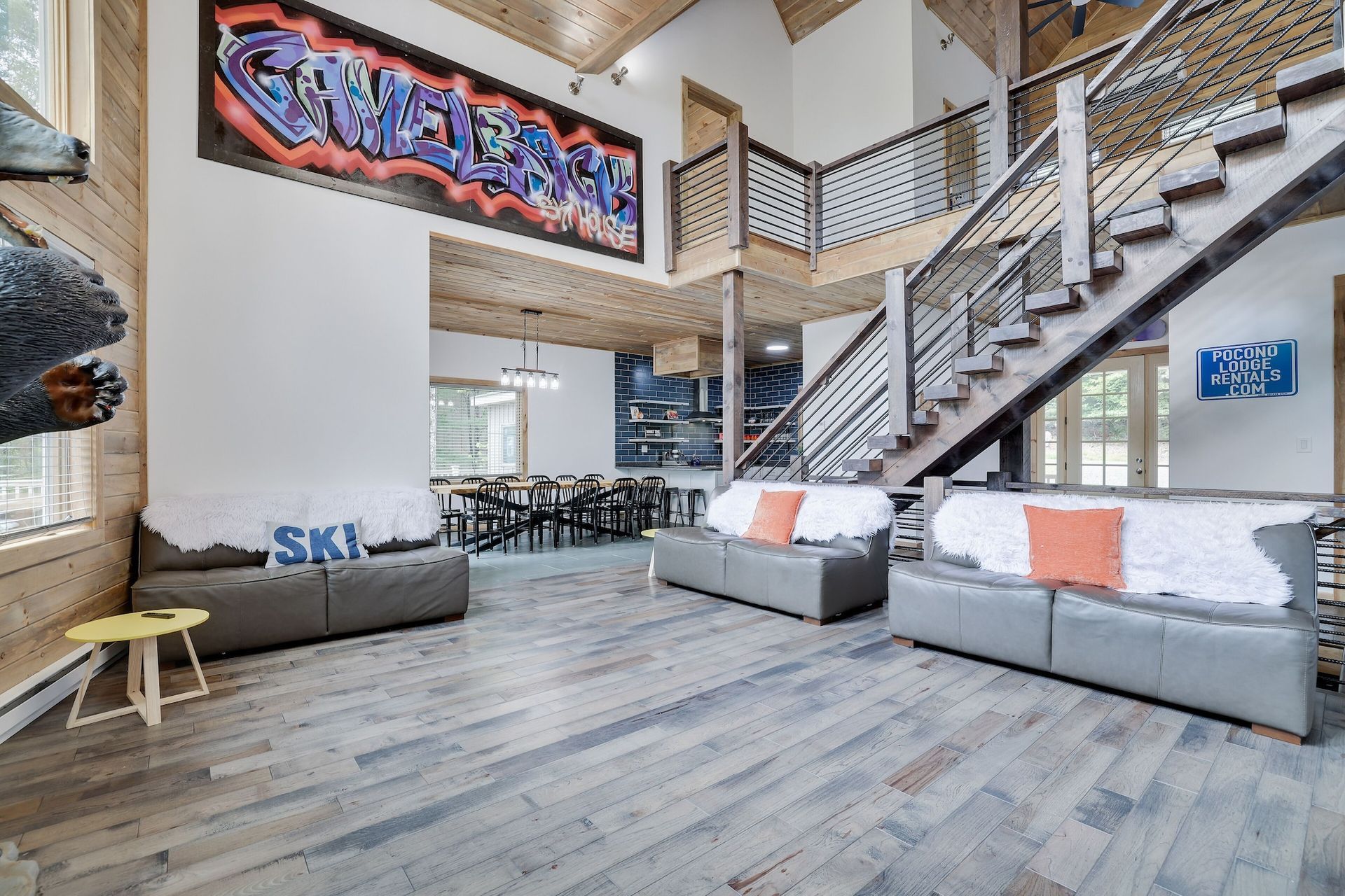 An aerial view of a living room with a couch and a christmas tree