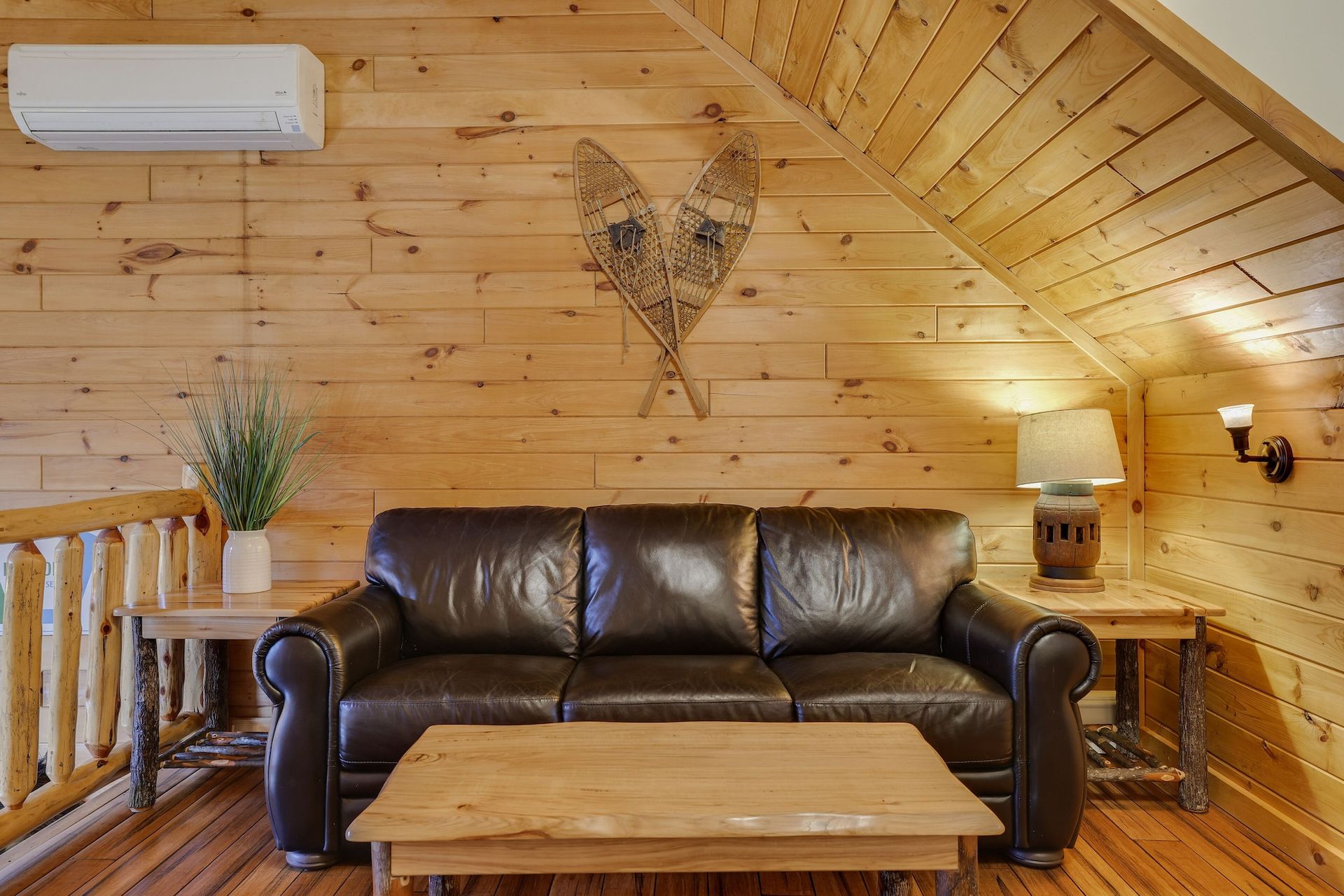 There is a couch and a coffee table in the living room.