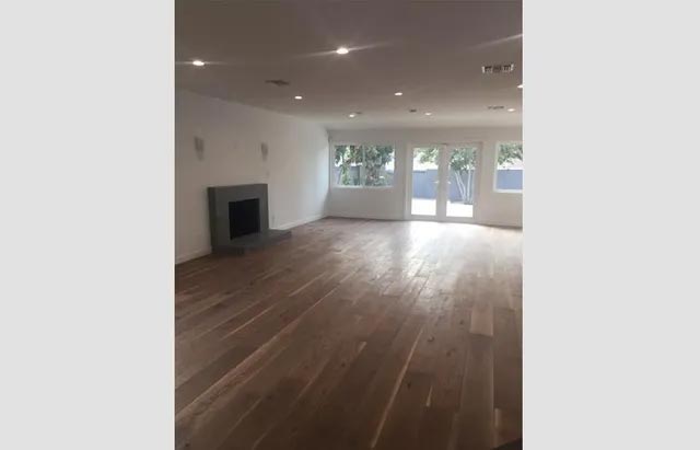 Wide Empty Room with Fireplace — Los Angeles, CA — K & Z Hardwood Flooring