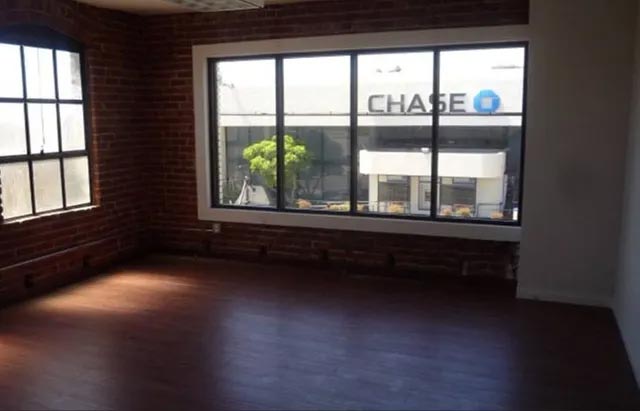 Room with Brick Wall and Wood Floor — Los Angeles, CA — K & Z Hardwood Flooring