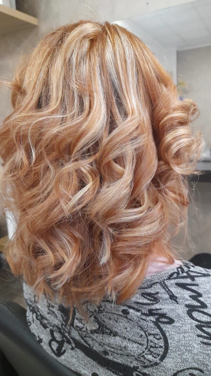 Acconciatura realizzata da Evolution Hair parrucchieri