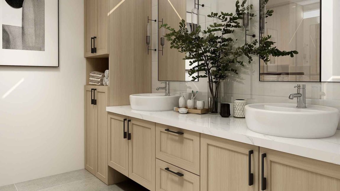 A bathroom with two sinks and a large mirror.