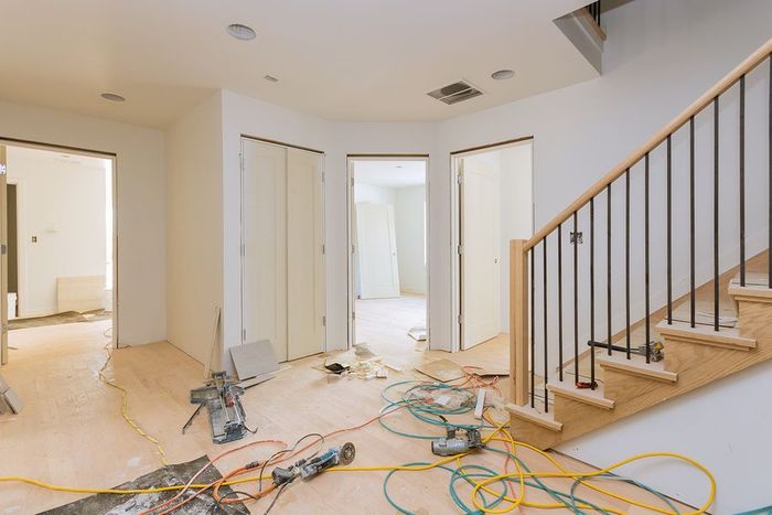 A staircase is being built in a house under construction