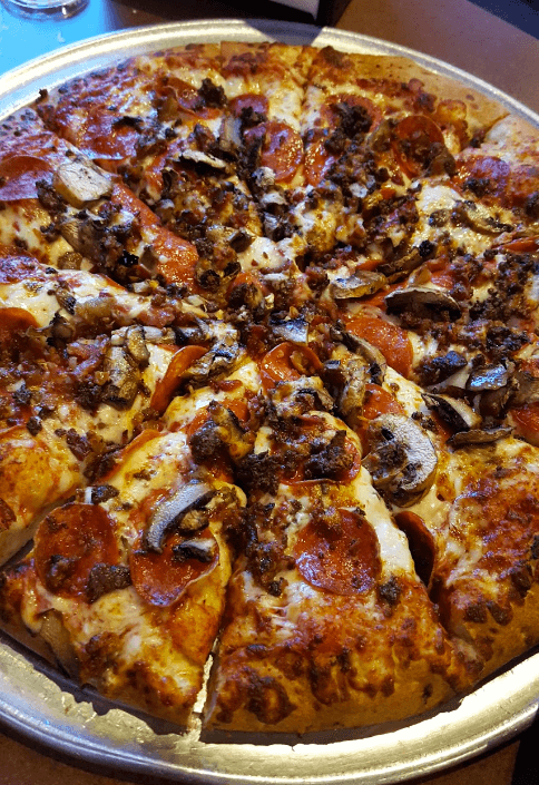 Pepperoni pizza with mushrooms
