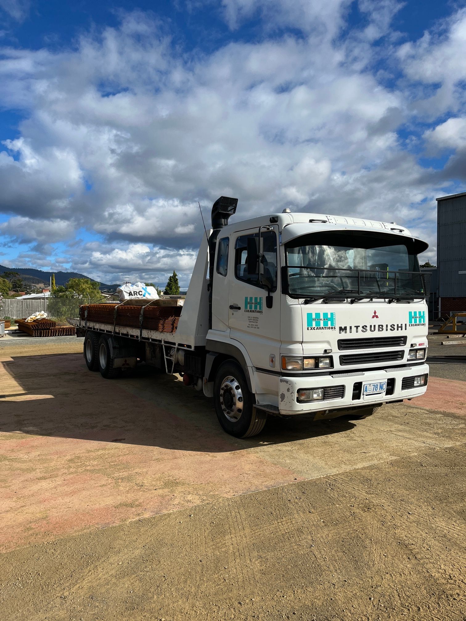 Two Kobelco SK135SR-7 Excavators

