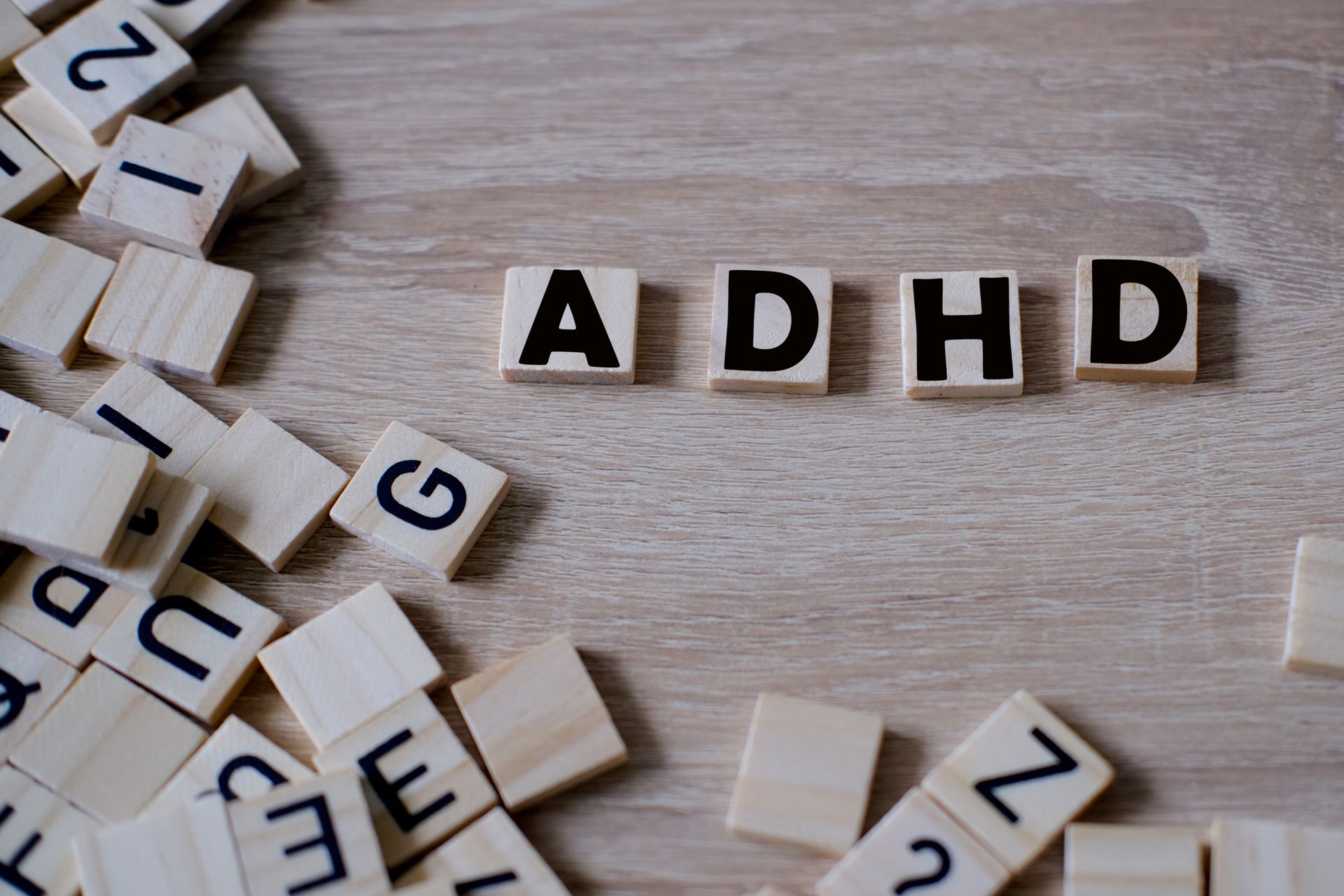 Attention deficit hyperactivity disorder, wooden alphabet blocks.