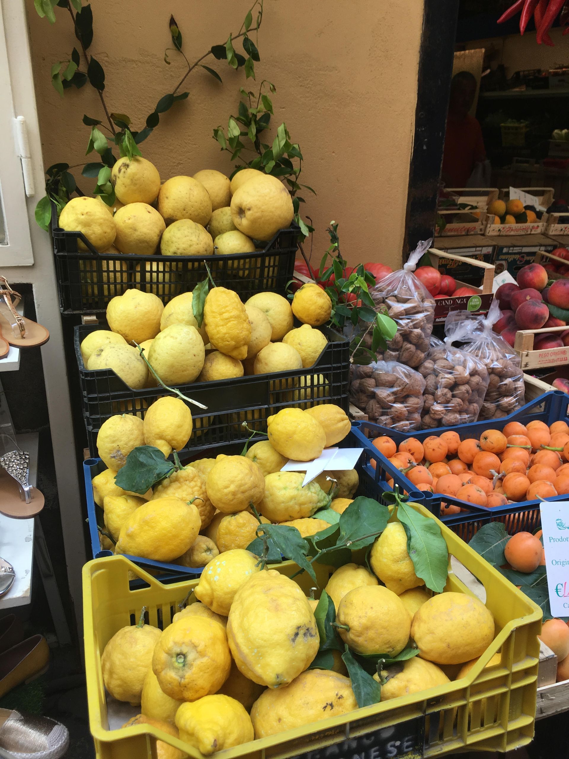 A bunch of lemons are sitting on a table