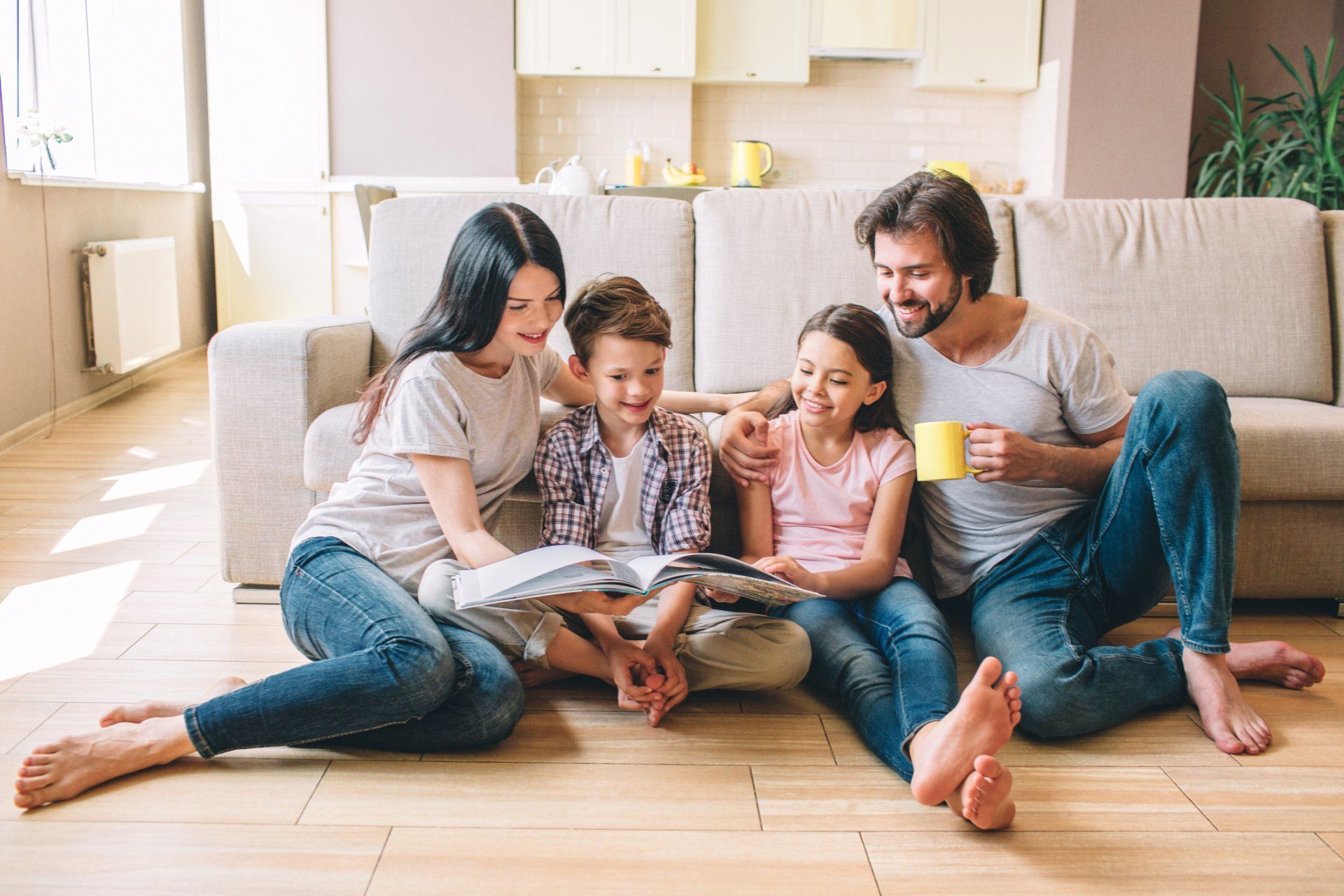 Happy Family Reading Books Together | Kansas City, Mo | MoVLIC