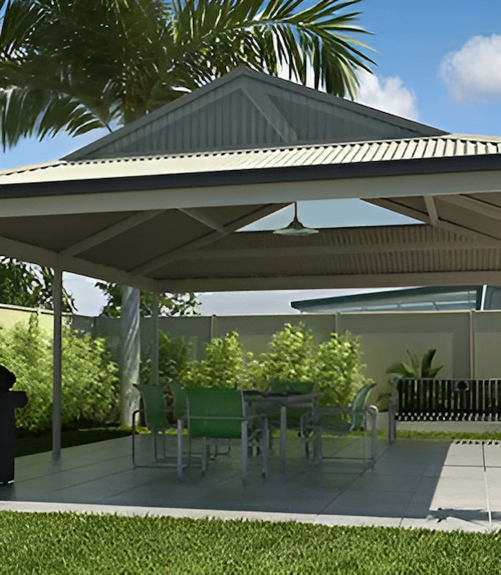 Gazebo With a Table and Chairs Underneath It — Downright Carpentry in Ryan, QLD