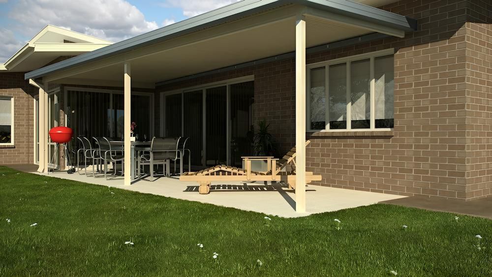 A Brick House With a Covered Patio With Chairs and a Grill — Downright Carpentry in Ryan, QLD