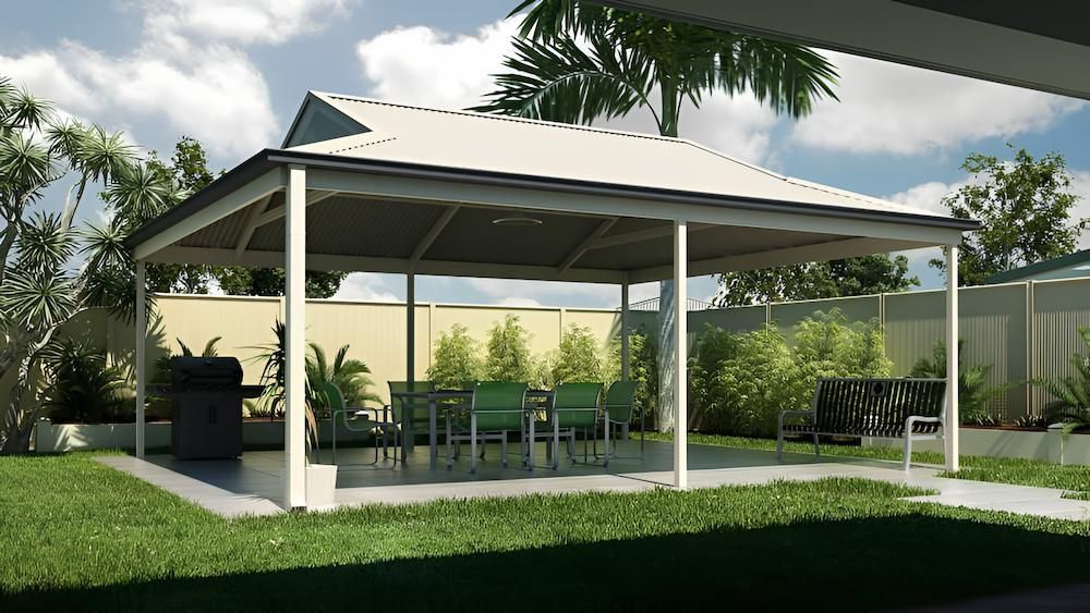 A Gazebo With a Table and Chairs Underneath It — Downright Carpentry in Pioneer, QLD