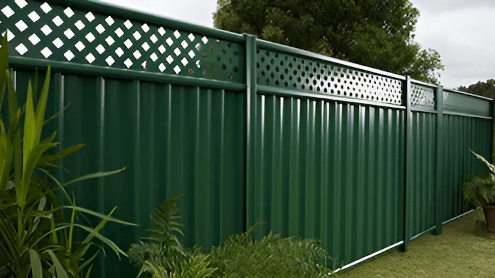Green Fence With a White Lattice on Top of It — Downright Carpentry in Ryan, QLD