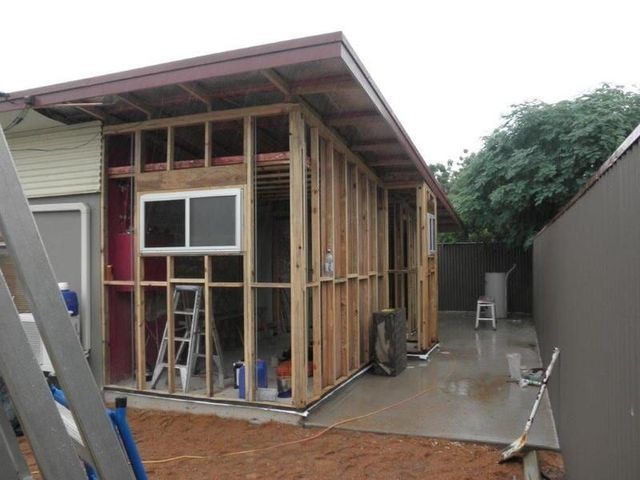 House That is Being Built With a Ladder in Front of It — Downright Carpentry in Ryan, QLD