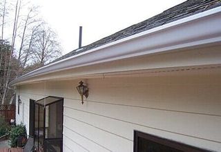 Gutter Repair | Holder Gutter Drainage System on the Roof | Bothell, WA