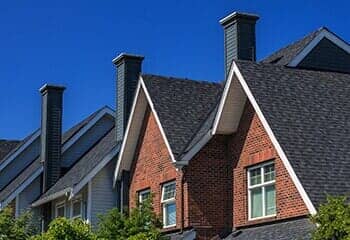 Gutters and Downspouts | Modern Roof Tile Building | Bothell, WA