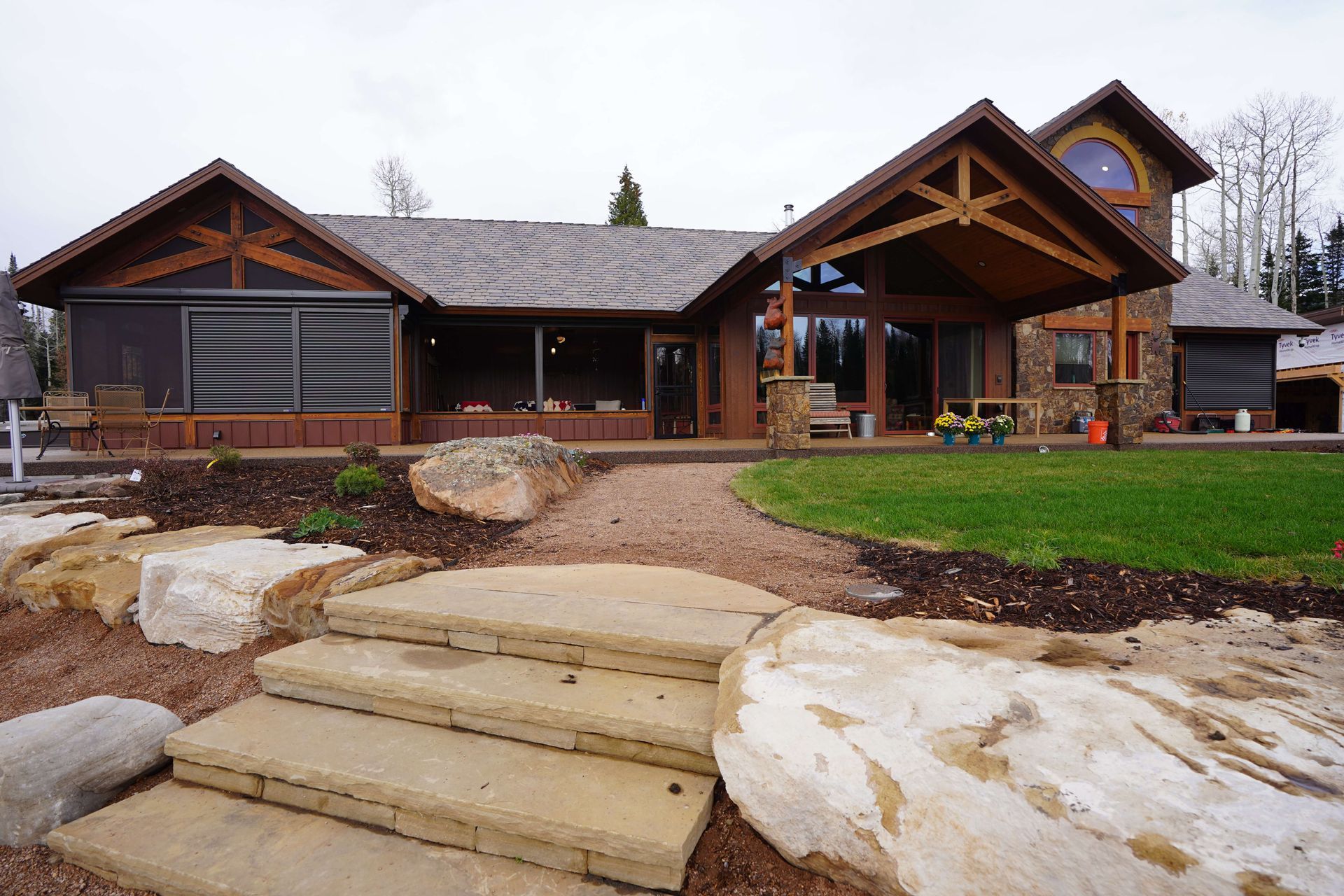 A large house with stairs leading up to it Maven Construction, Montrose, CO
