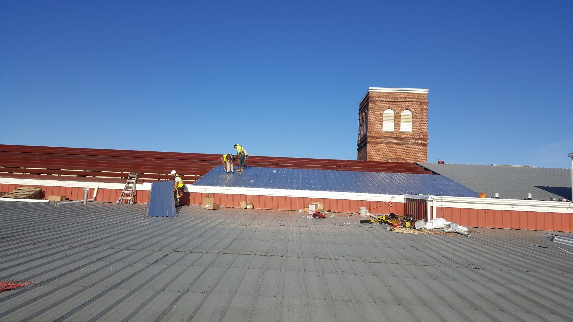 Workers On The Roof — Phoenix, AZ — Halo Metal Roofing
