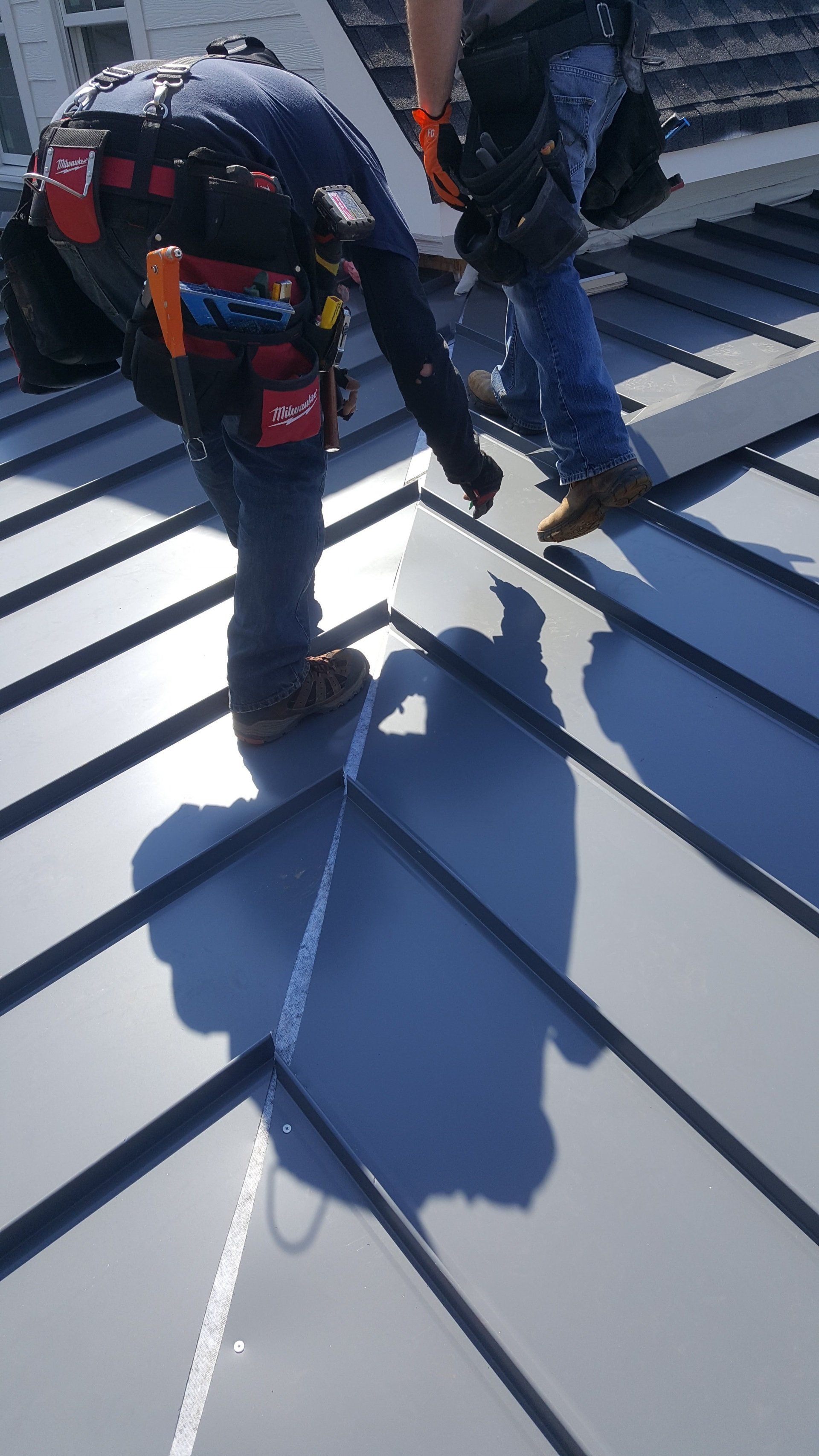 Workers Repairing The Roof — Phoenix, AZ — Halo Metal Roofing