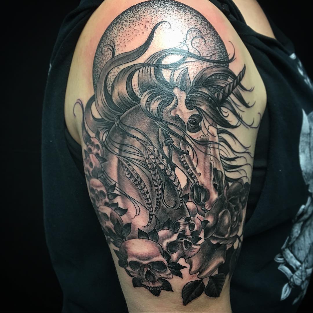Unicorn and Skulls Tattoo by Dale Moostoos at Crimson Empire Tattoo in Edmonton Alberta Canada