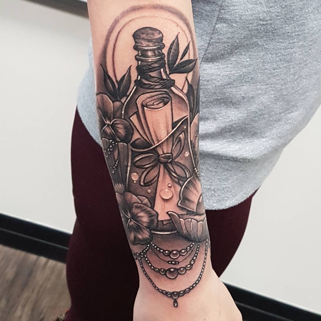 Message in a Bottle Tattoo by Sasha Day at Black Gold Tattoo Co in Edmonton Alberta Canada