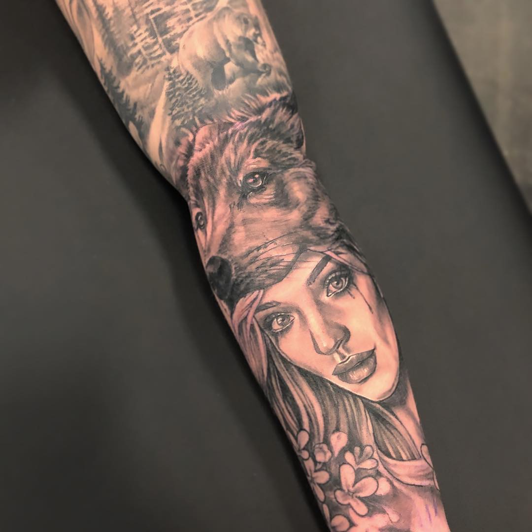 Floral and Huntress Tattoo by Sarah Michelle at Black Gold Tattoo Co in Edmonton Alberta Canada
