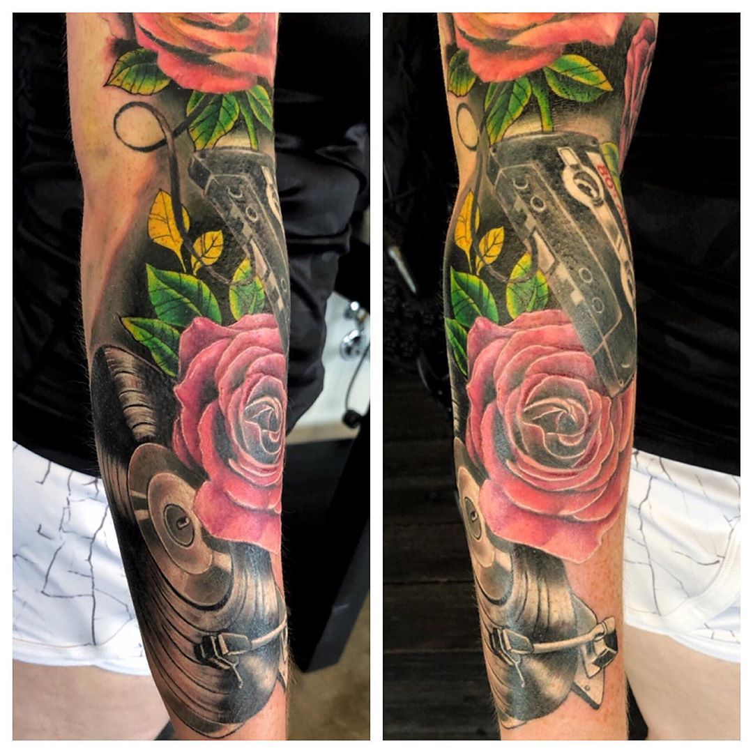 Roses Vinyl Record Cassette Tattoo by Chad Lavers at Crimson Empire Tattoo in Edmonton Alberta Canada