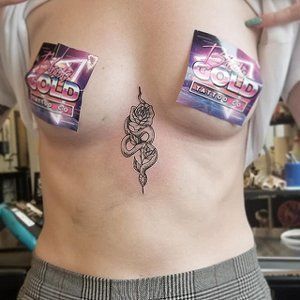 Snake and Rose Tattoo by Adrienne Alexander at Crimson Empire Tattoo in Edmonton Alberta Canada