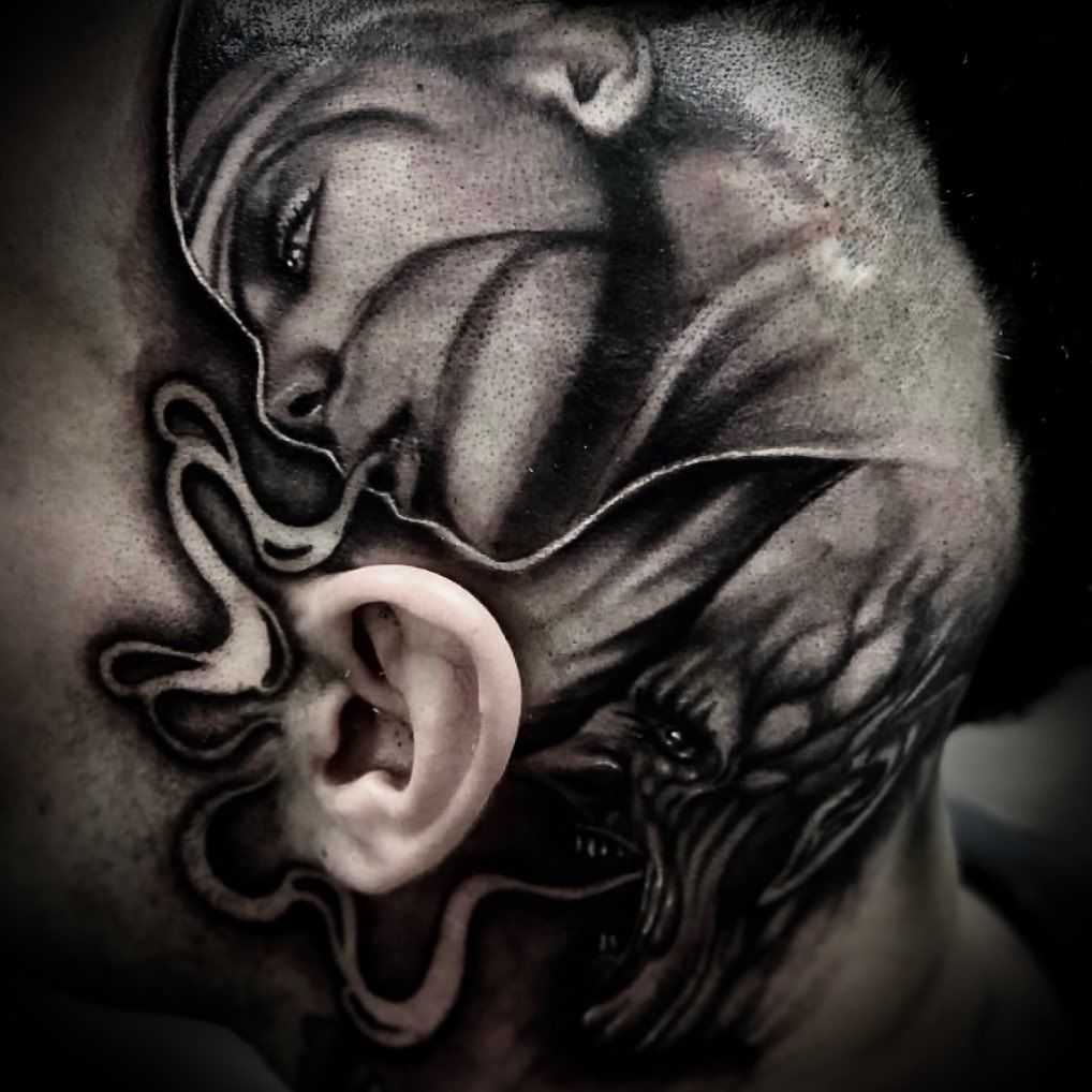 Angel and Devil Whispering Tattoo by Romeo Ostiguy at Black Gold Tattoo Co in Edmonton Alberta Canada