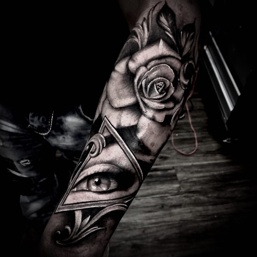 Eye and Rose Tattoo by Romeo Ostiguy at Black Gold Tattoo Co in Edmonton Alberta Canada