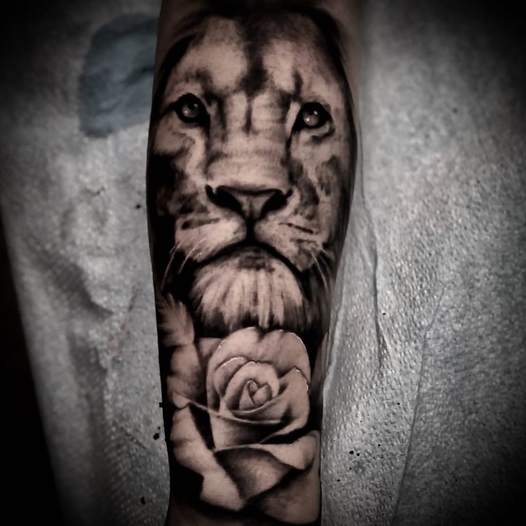 Lion and Rose Tattoo by Romeo Ostiguy at Black Gold Tattoo Co in Edmonton Alberta Canada