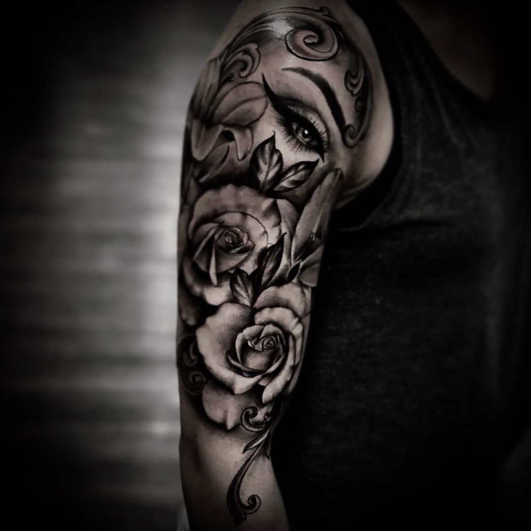 Roses and Eye Tattoo by Romeo Ostiguy at Black Gold Tattoo Co in Edmonton Alberta Canada