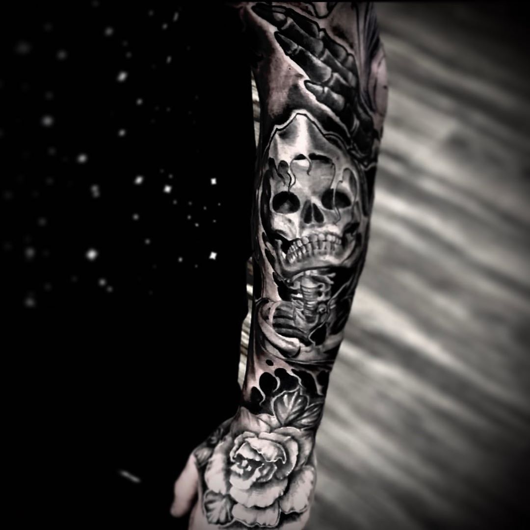 Skeleton and Rose Tattoo by Romeo Ostiguy at Black Gold Tattoo Co in Edmonton Alberta Canada