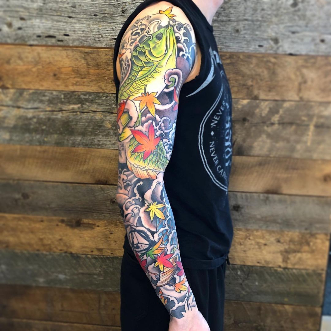 Arowana Sleeve by Curt Semeniuk at Crimson Empire Tattoo in Edmonton Alberta Canada