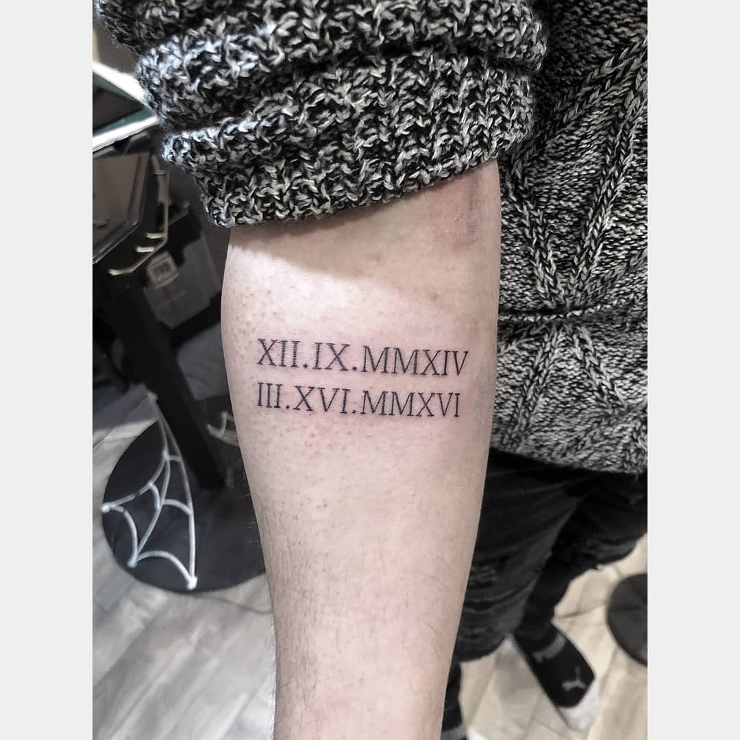 Roman Numerals Tattoo by Tony Honning at Crimson Empire Tattoo in Edmonton Alberta Canada