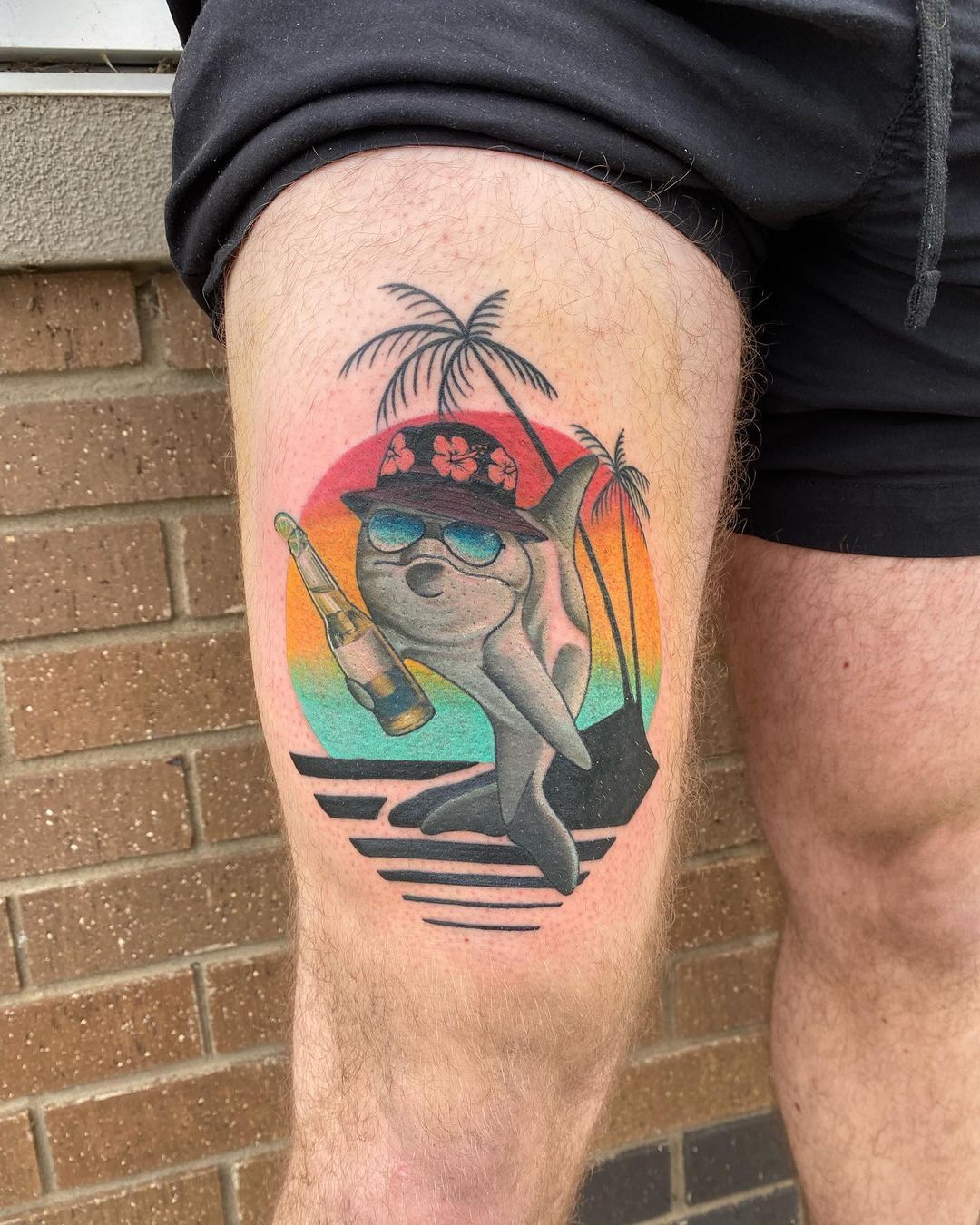 Summertime Dolphin Tattoo by Dale Moostoos at Crimson Empire Tattoo in Edmonton Alberta Canada