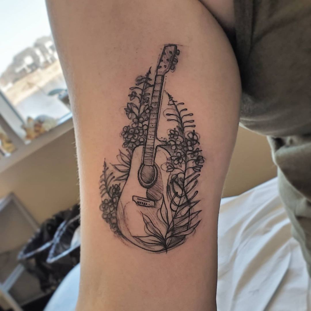 Guitar and Floral Tattoo by Adrienne Alexander at Crimson Empire Tattoo in Edmonton Alberta Canada